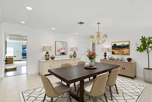 a view of empty room with wooden floor and fireplace