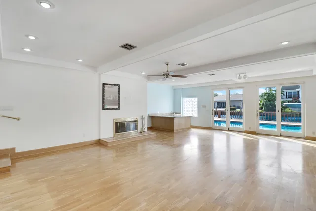 a kitchen with stainless steel appliances granite countertop a sink and cabinets