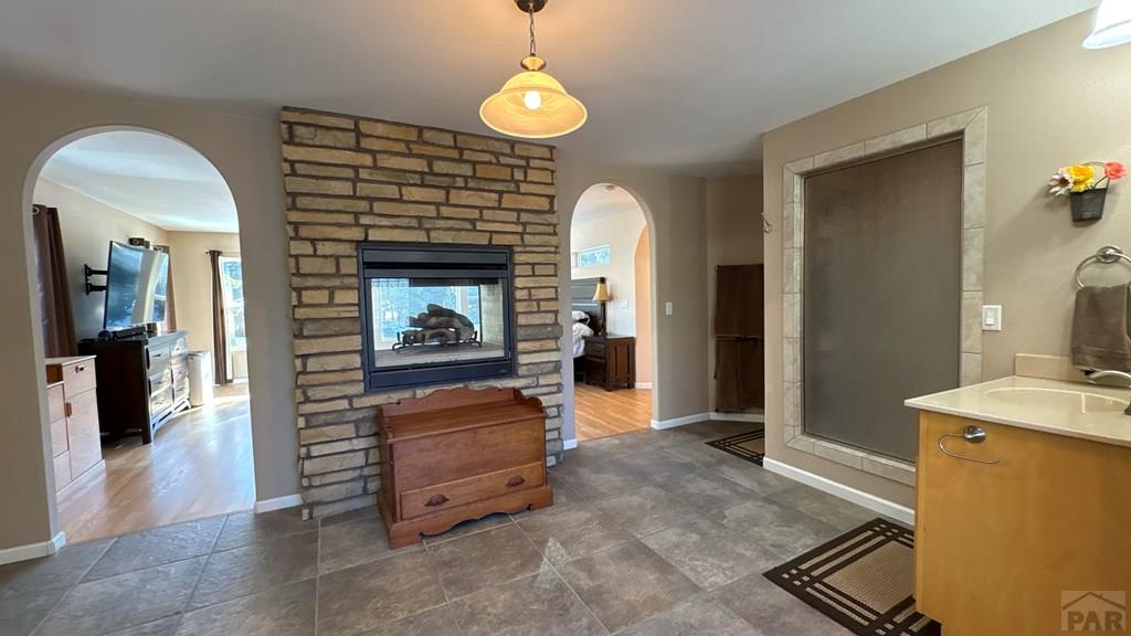 8295 Green Lane Rye, CO 81069 - Photo 72 of 88 a living room with furniture and a fireplace