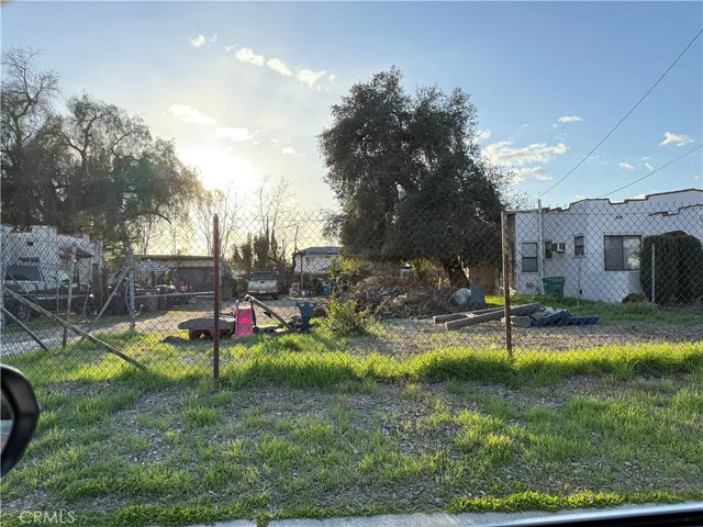 a view of a park with swings and slides