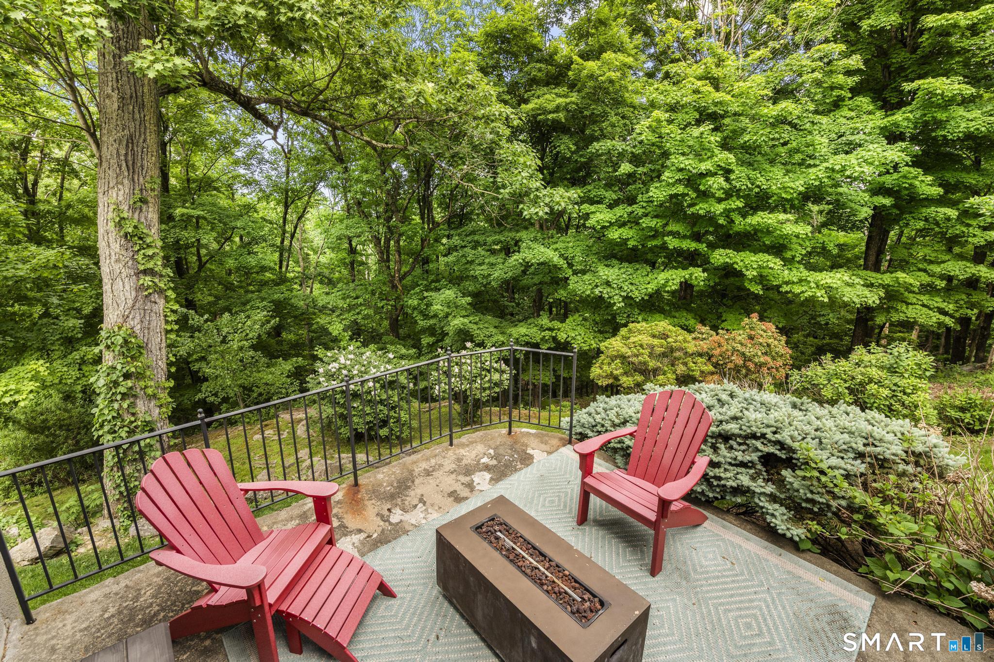 12 Logans Way Danbury, CT 06811 - Photo 36 of 40 an outdoor sitting area with couch and outdoor seating