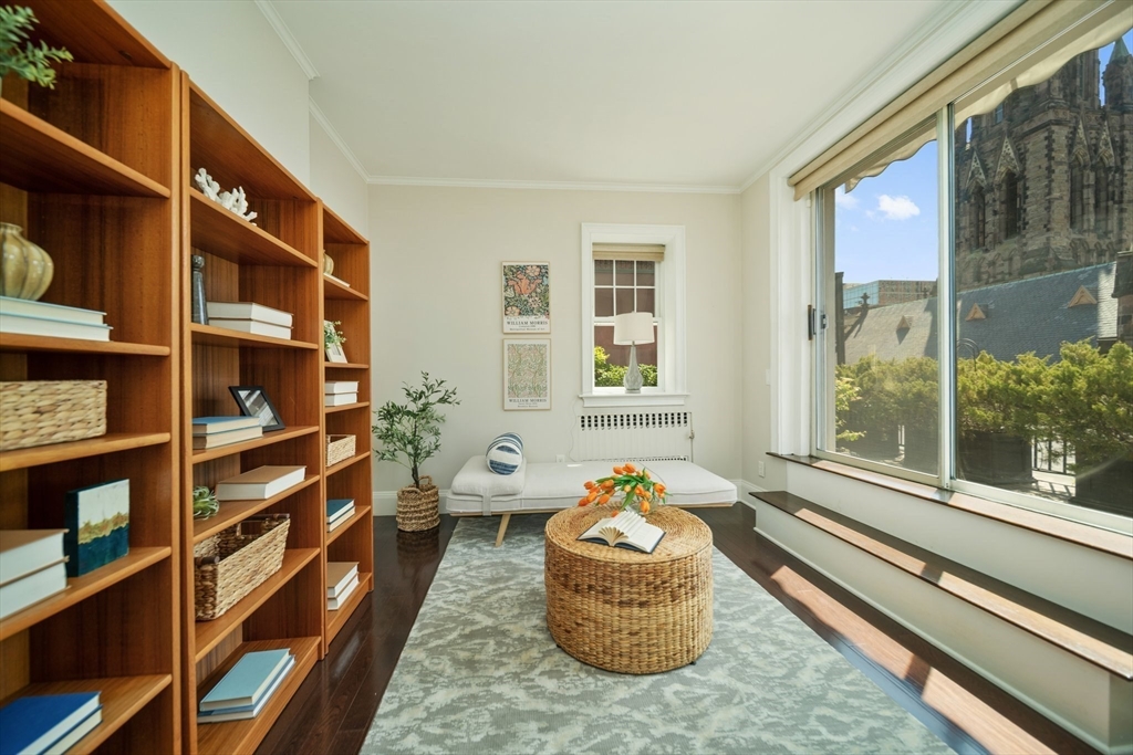 56 Commonwealth Avenue, Unit PH Boston, MA 02116 - Photo 21 of 33 a living room filled with furniture and a potted plant
