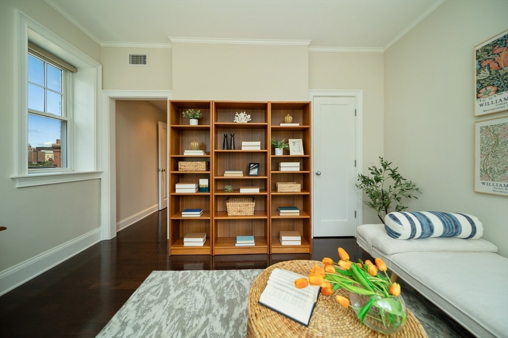 56 Commonwealth Avenue, Unit PH Boston, MA 02116 - Photo 22 of 33 a living room with furniture and a potted plant