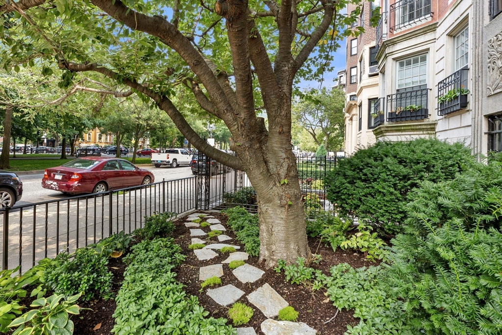 56 Commonwealth Avenue, Unit PH Boston, MA 02116 - Photo 30 of 33 a street view with wooden fence
