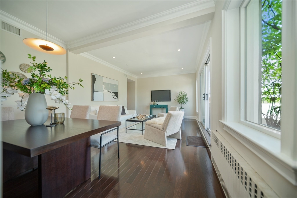 56 Commonwealth Avenue, Unit PH Boston, MA 02116 - Photo 6 of 33 a view of a living room and dining room