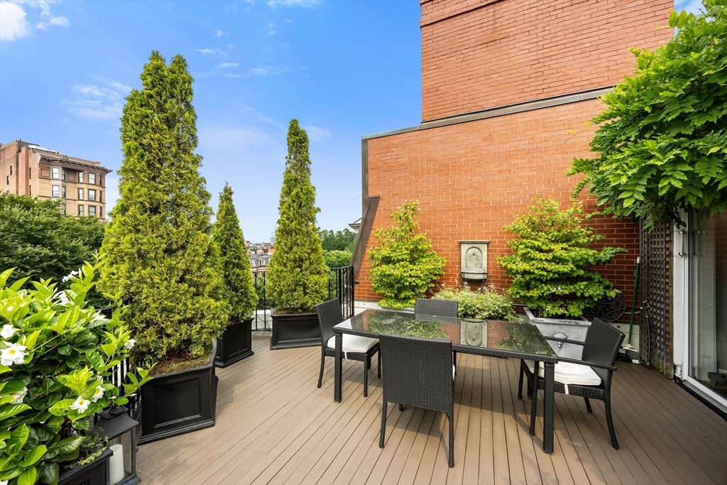 56 Commonwealth Avenue, Unit PH Boston, MA 02116 - Photo 7 of 33 a view of a chairs and table in the patio
