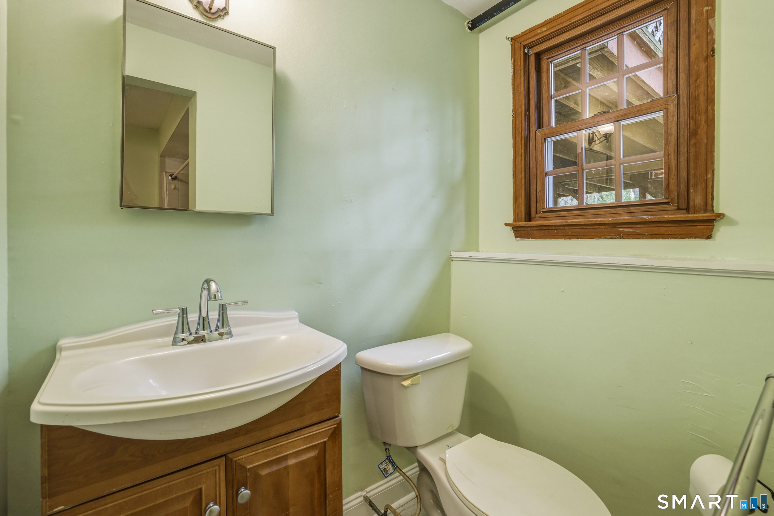 10 Salem Road Madison, CT 06443 - Photo 28 of 31 The updated vanity and medicine cabinet provide extra storage in the lower level Full Bathroom.