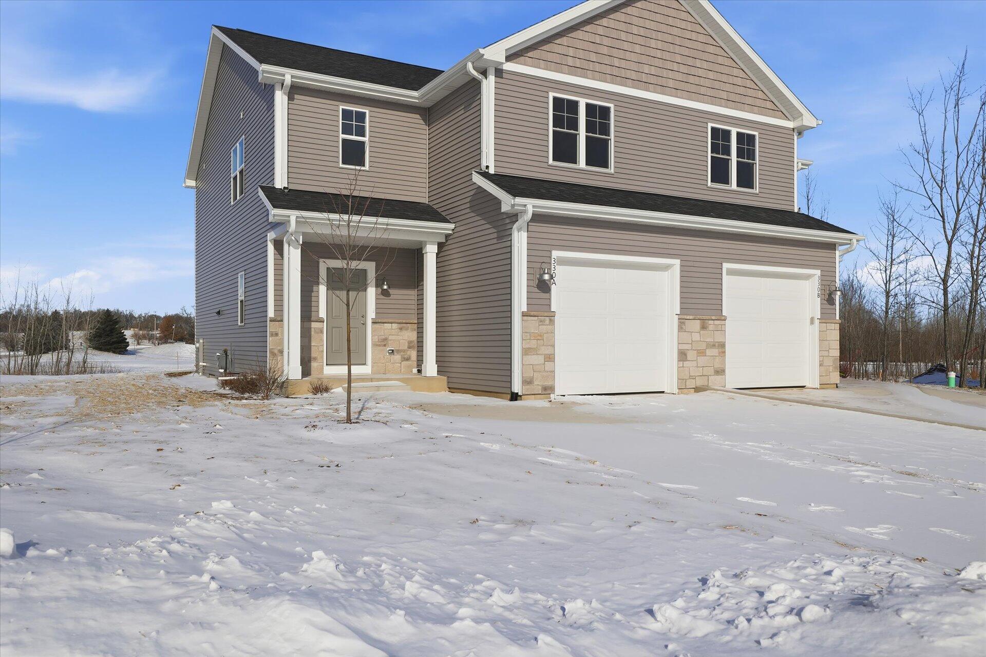 330 Cattail Court, Unit A Genoa City, WI 53128 - Photo 1 of 24 Front of Building