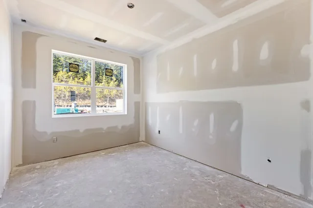 an empty room with windows