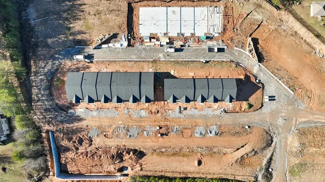 a view of a back yard with a building