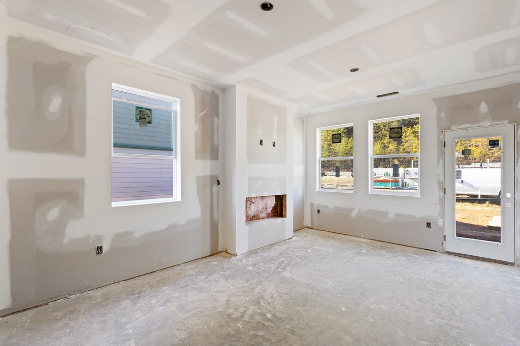 33 Grove Loop Blue Ridge, GA 30513 - Photo 9 of 47 an empty room with windows