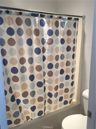 a white and black and white shower curtain