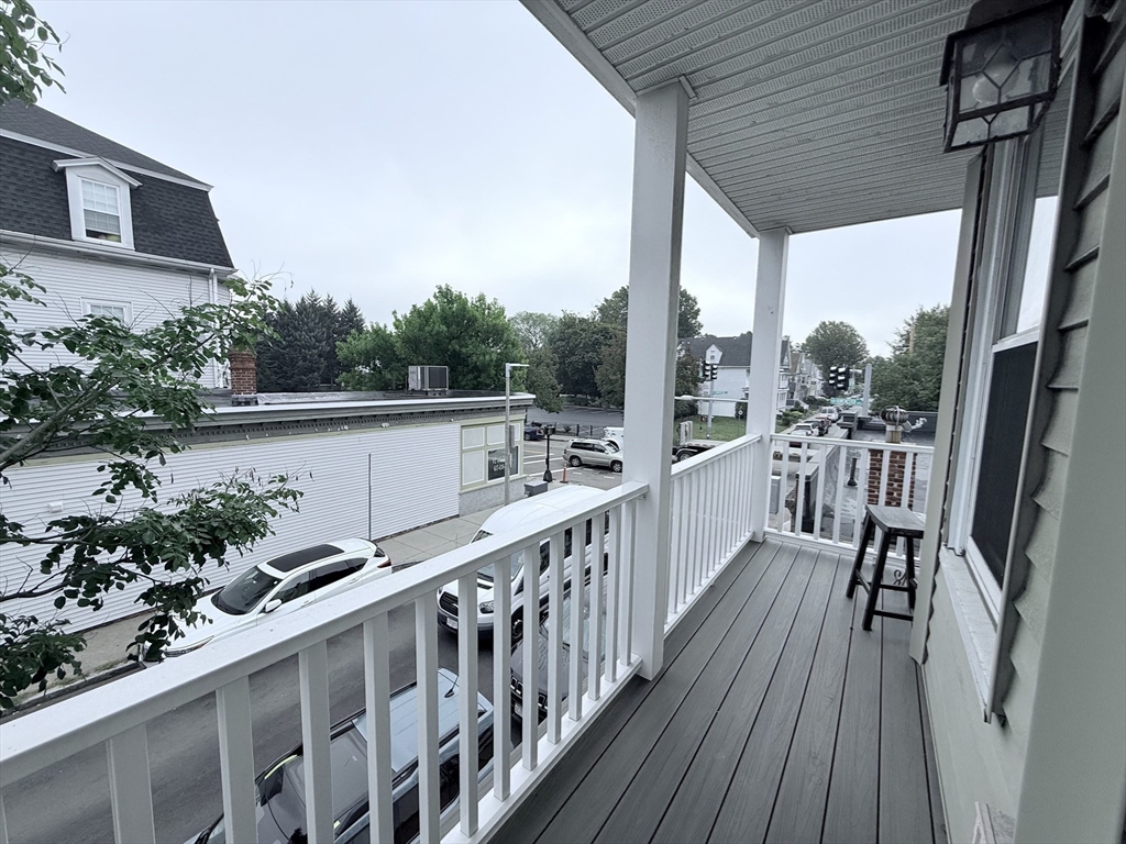2 A Victoria Street, Unit 2A Boston, MA 02125 - Photo 12 of 13 a view of a balcony with furniture