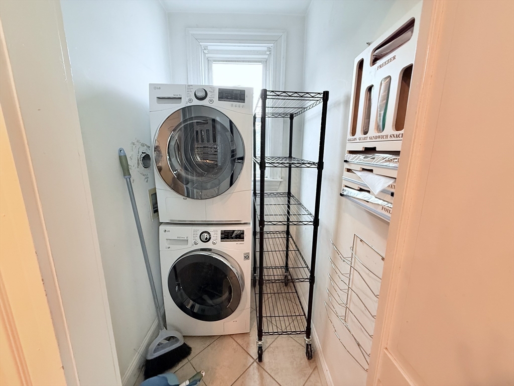2 A Victoria Street, Unit 2A Boston, MA 02125 - Photo 10 of 13 a utility room with dryer and washer