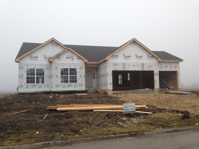 40W221 Palmer Road Geneva, IL 60134 - Photo 1 of 22 a front view of a house with garden