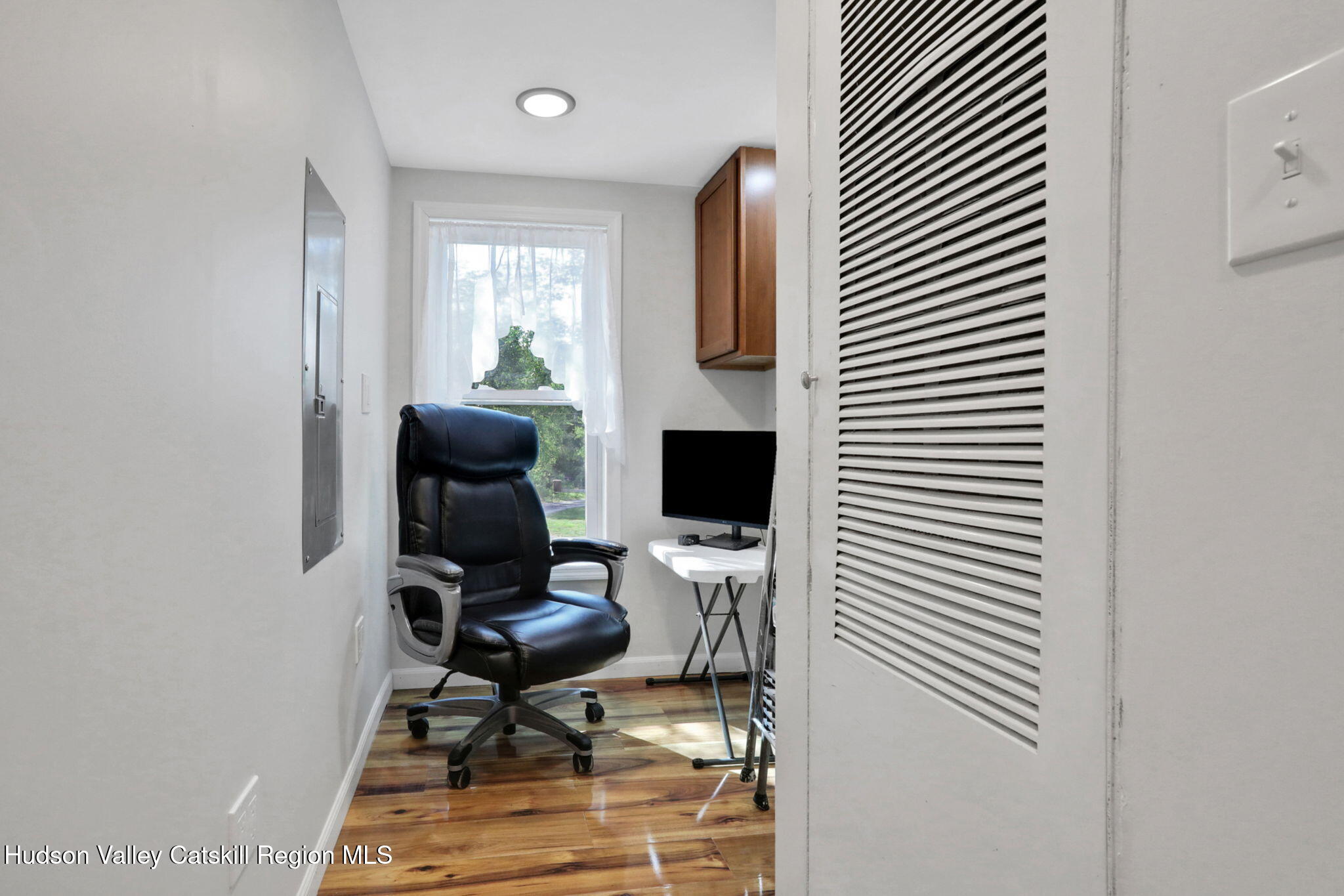135 Patch Road Saugerties, NY 12477 - Photo 12 of 21 a workspace with furniture and a window