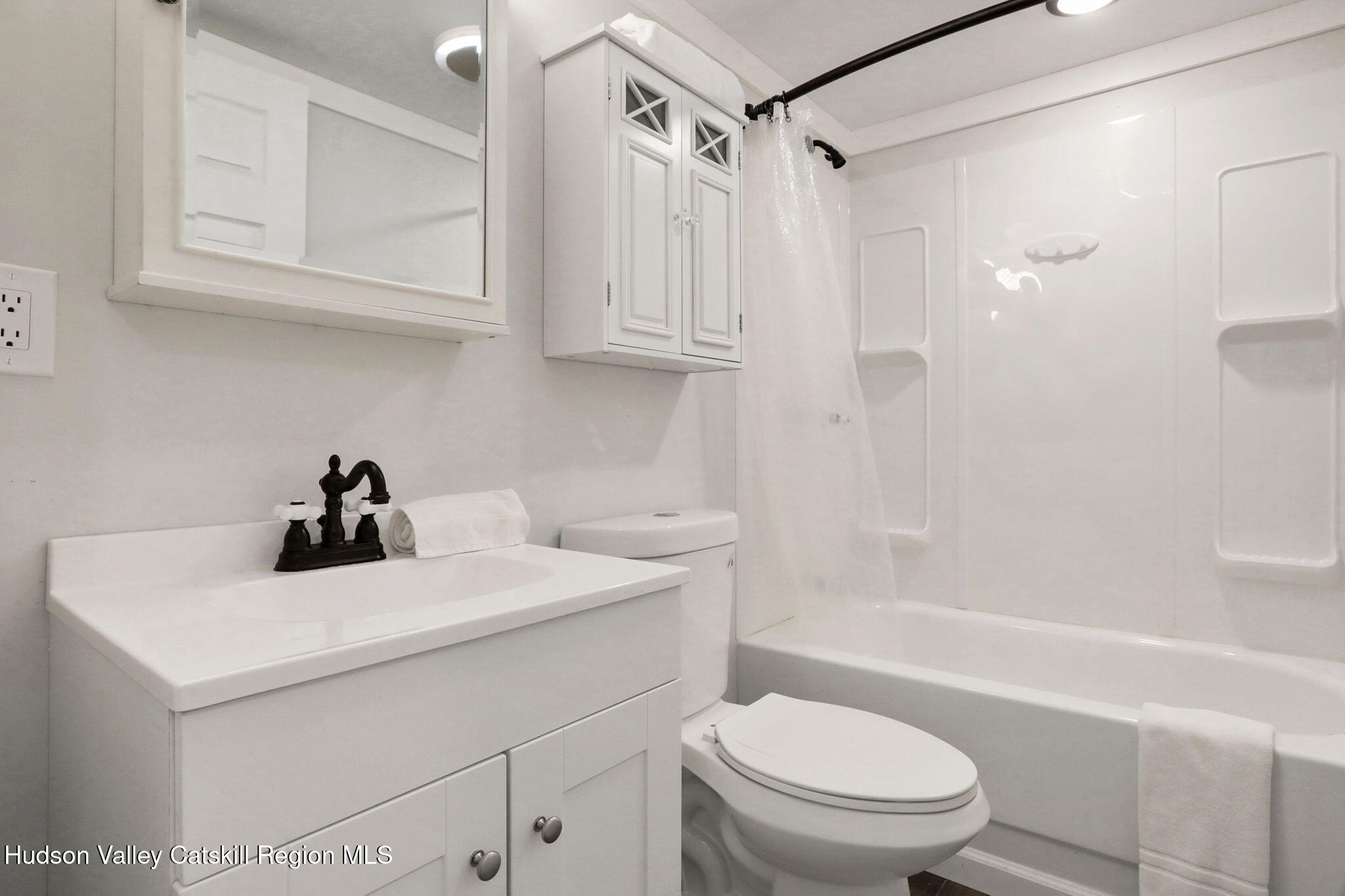 135 Patch Road Saugerties, NY 12477 - Photo 10 of 21 a bathroom with a sink a toilet and shower