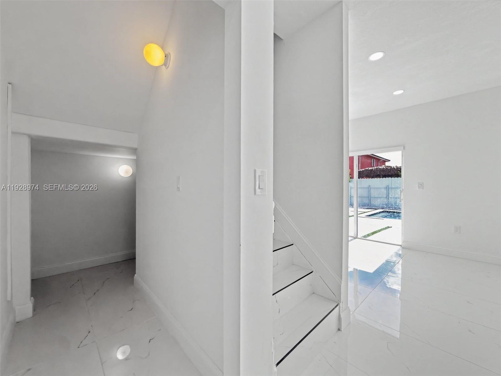 15064 Southwest 30th Terrace Miami, FL 33185 - Photo 21 of 60 a view of an empty room and an entryway