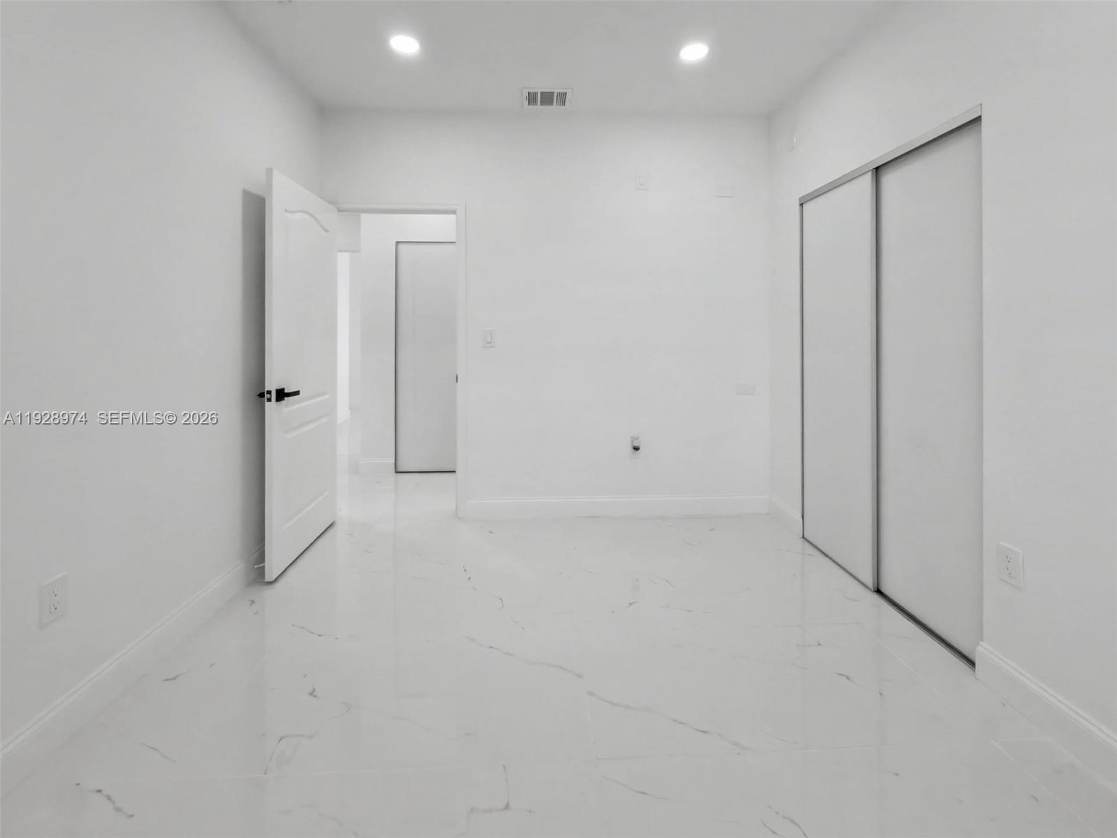 15064 Southwest 30th Terrace Miami, FL 33185 - Photo 26 of 60 a view of an empty room