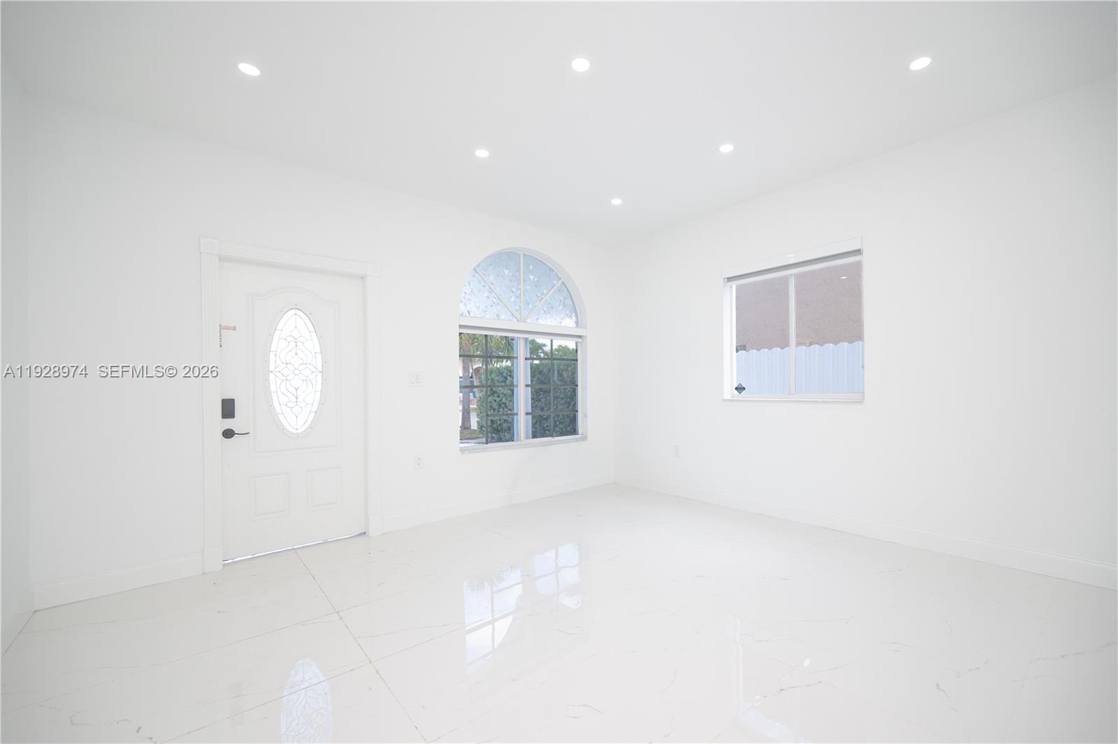 15064 Southwest 30th Terrace Miami, FL 33185 - Photo 30 of 60 an empty room with windows