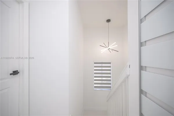 a bathroom with a shower a toilet and sink