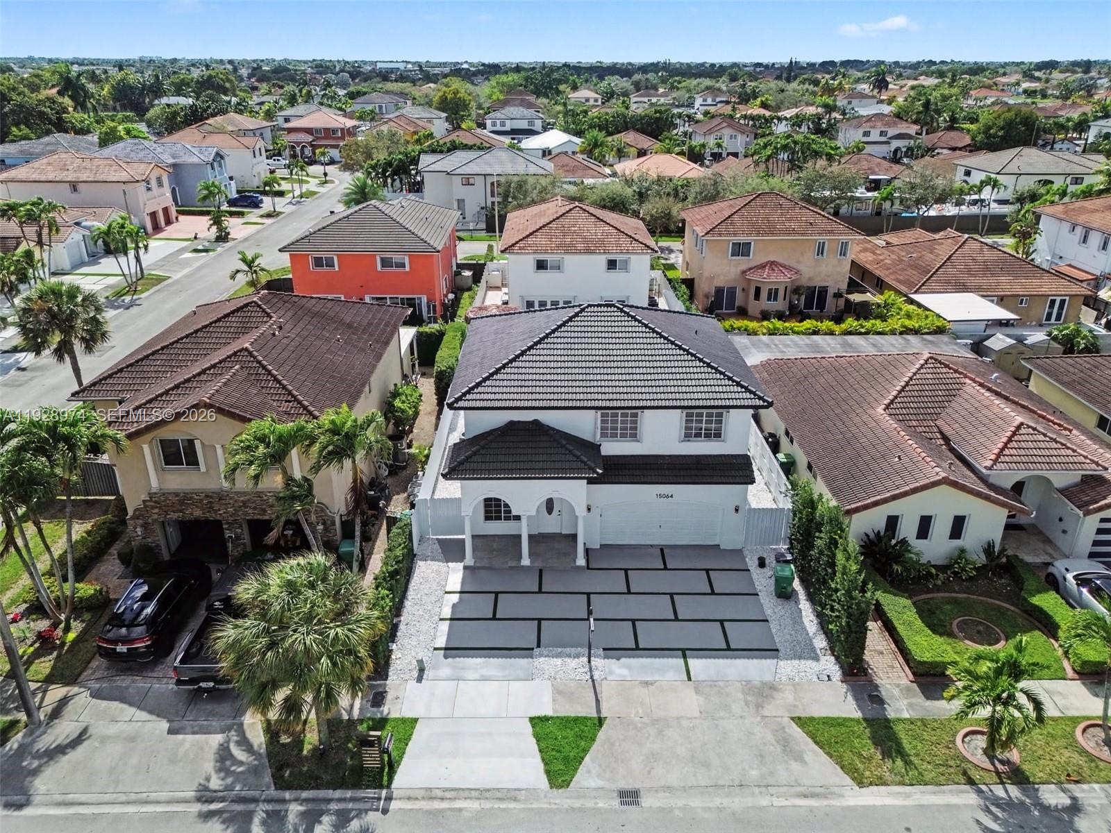 15064 Southwest 30th Terrace Miami, FL 33185 - Photo 59 of 60 an aerial view of a house with a yard