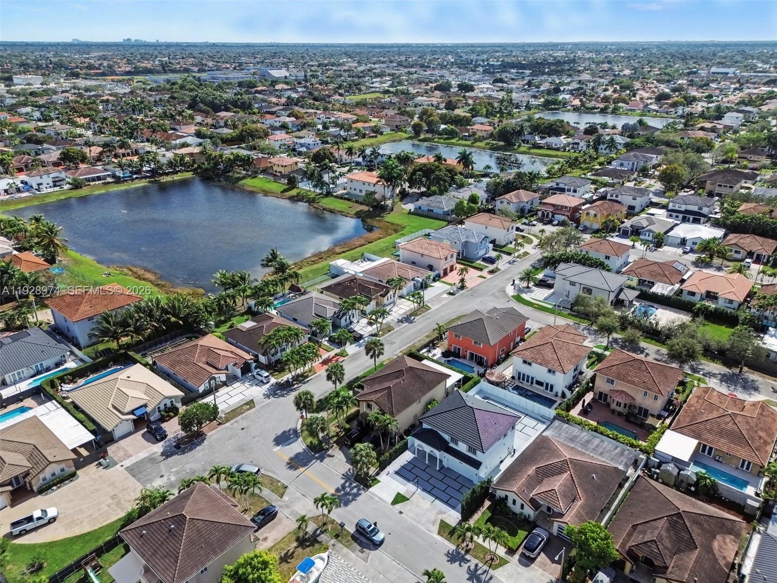 15064 Southwest 30th Terrace Miami, FL 33185 - Photo 60 of 60 an aerial view of a city with lots of residential buildings