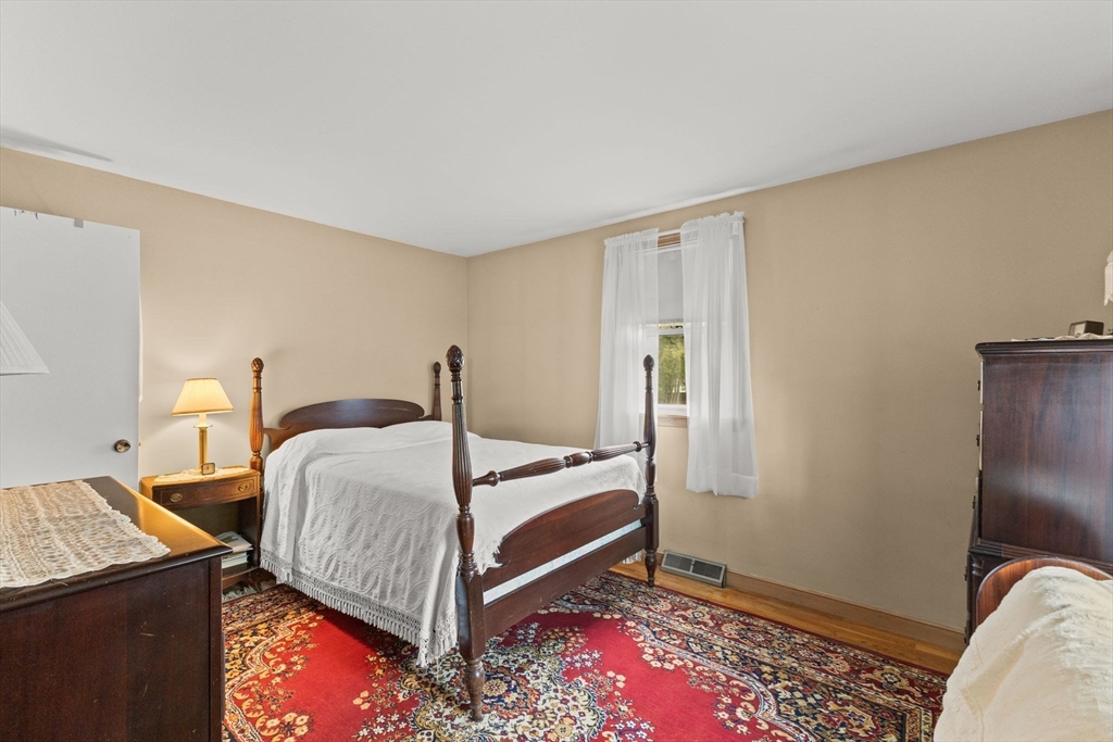 16 Fencourt Road Canton, MA 02021 - Photo 23 of 34 a bedroom with a bed and a dresser