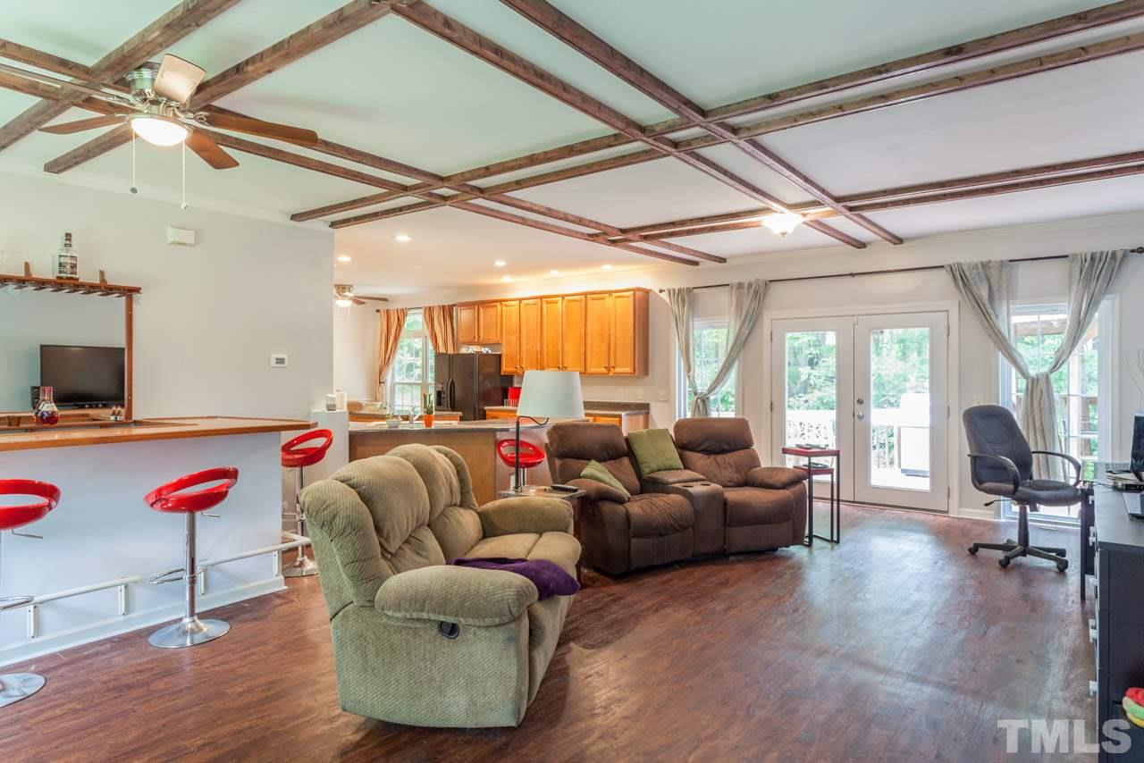 2092 Suitts Store Road Franklinton, NC 27525 - Photo 2 of 21 a living room with furniture and wooden floor