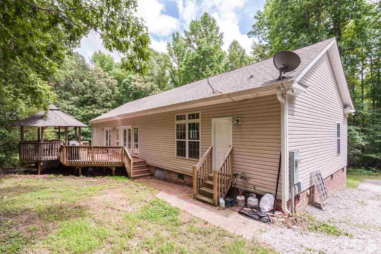 2092 Suitts Store Road Franklinton, NC 27525 - Photo 17 of 21 a view of a house with a yard