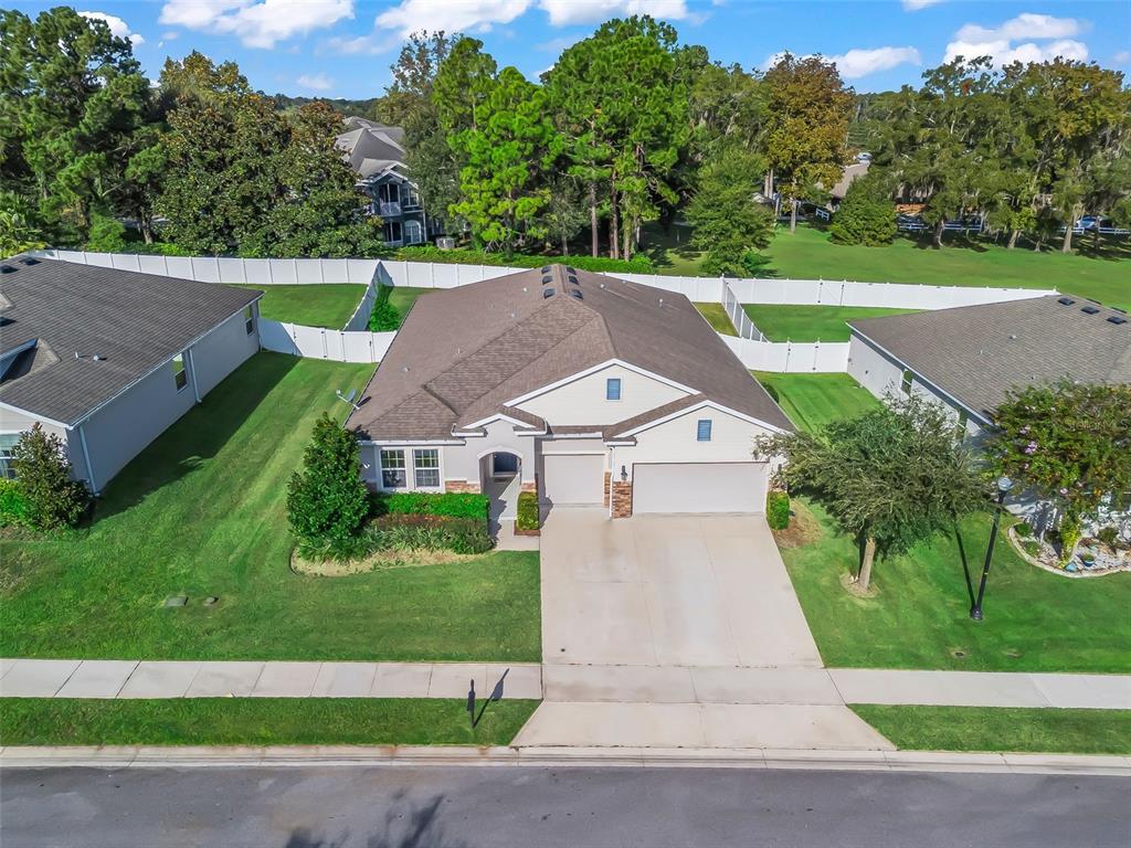5626 Southwest 50th Court Ocala, FL 34474 - Photo 2 of 33 a aerial view of a house with a yard