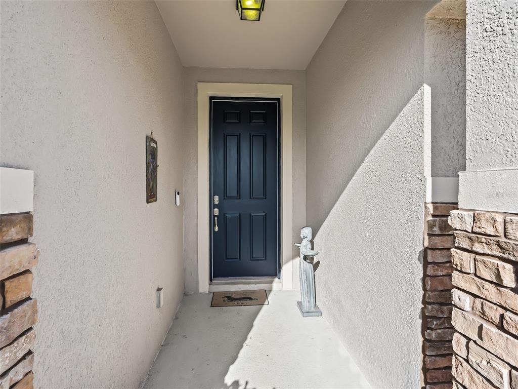 5626 Southwest 50th Court Ocala, FL 34474 - Photo 3 of 33 a view of entryway with furniture and rug