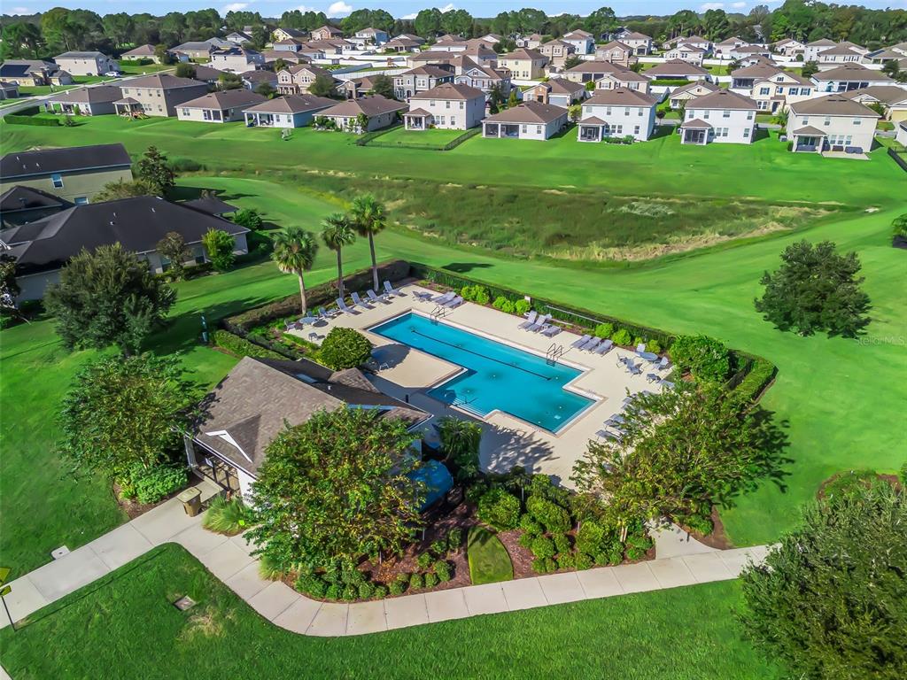 5626 Southwest 50th Court Ocala, FL 34474 - Photo 31 of 33 an aerial view of residential houses with outdoor space and trees
