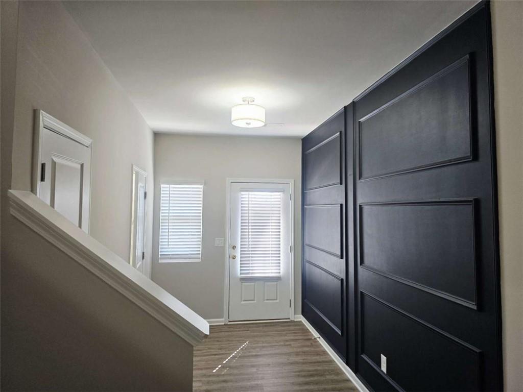 213 North Fortune Way Dallas, GA 30157 - Photo 3 of 24 a view of hallway with an empty room