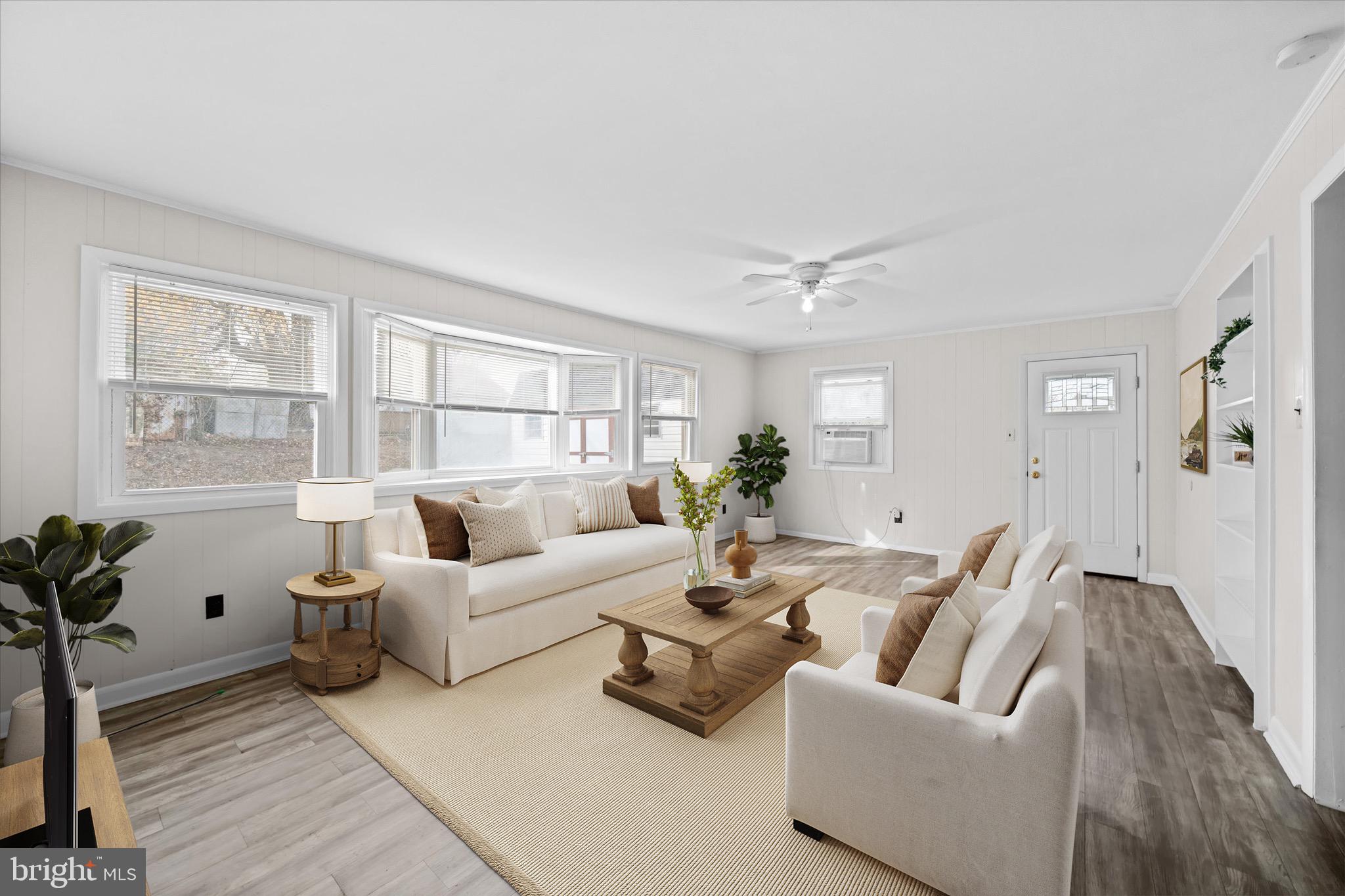 124 Festone Avenue New Castle, DE 19720 - Photo 17 of 43 a living room with furniture and a large window