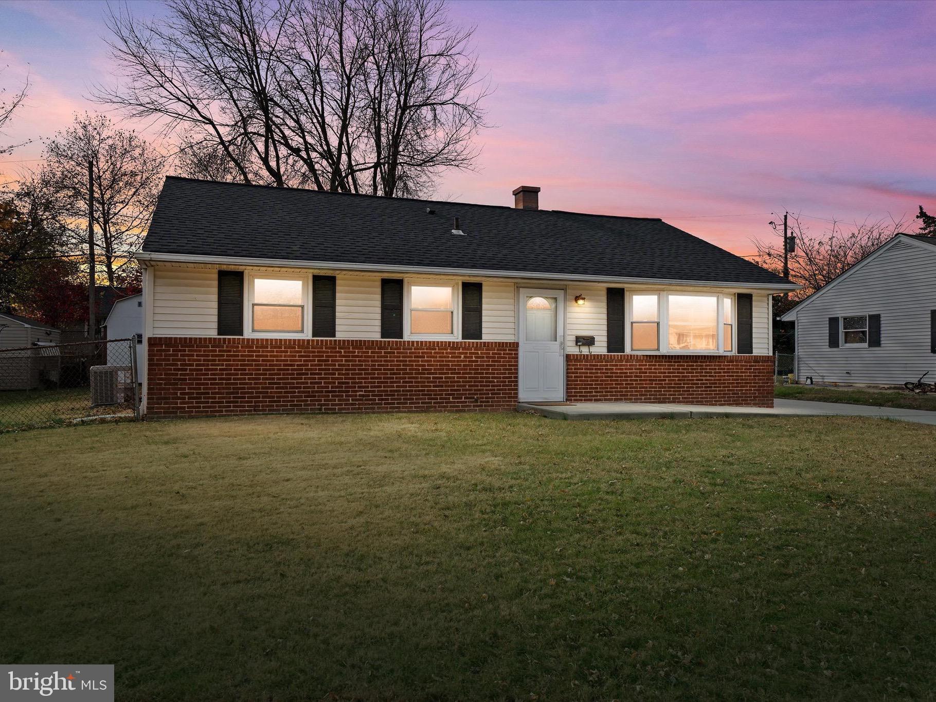 124 Festone Avenue New Castle, DE 19720 - Photo 2 of 43 a front view of a house with a yard