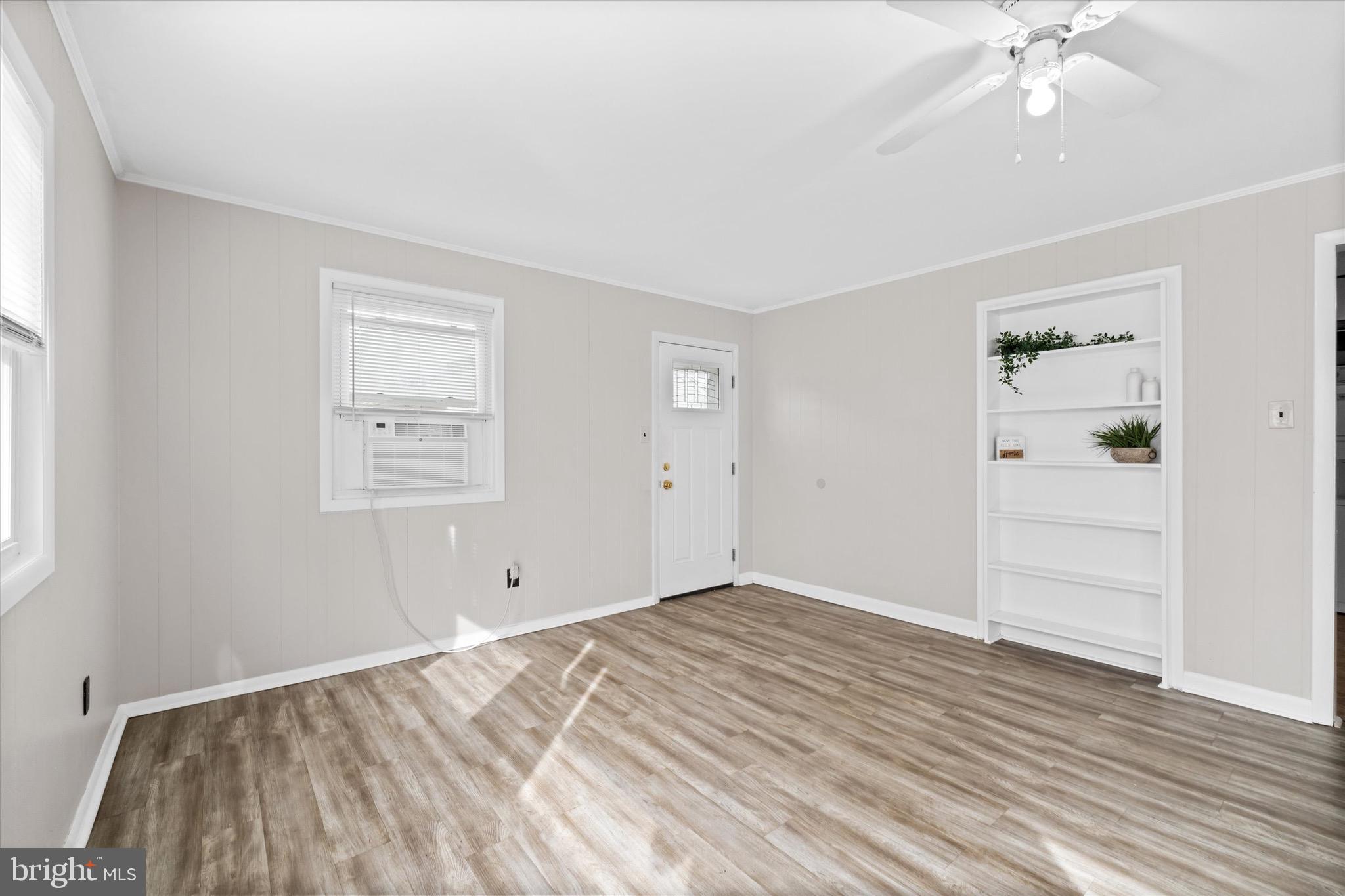 124 Festone Avenue New Castle, DE 19720 - Photo 21 of 43 wooden floor in an empty room