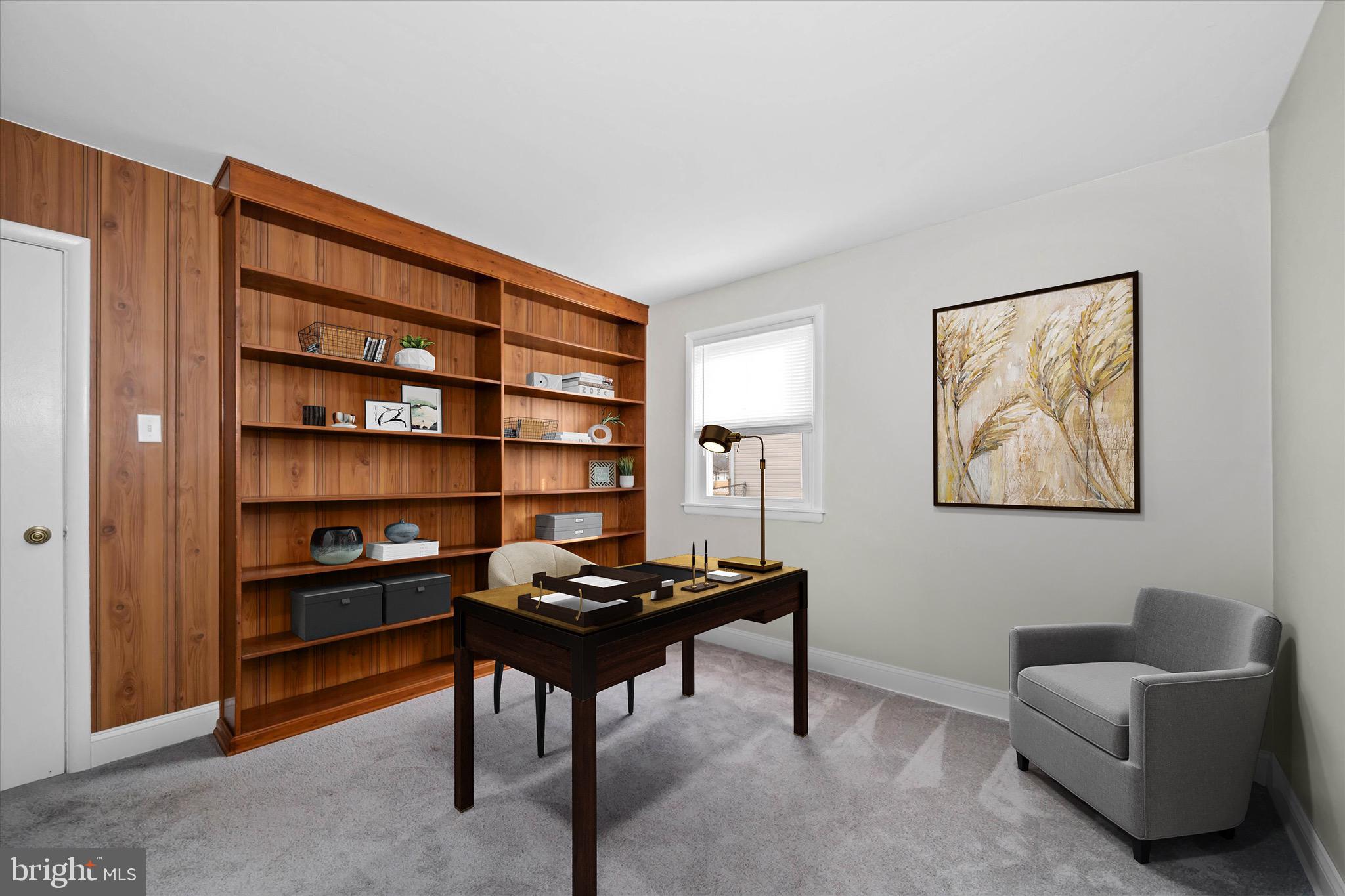 124 Festone Avenue New Castle, DE 19720 - Photo 25 of 43 a view of a livingroom with workspace and a couch