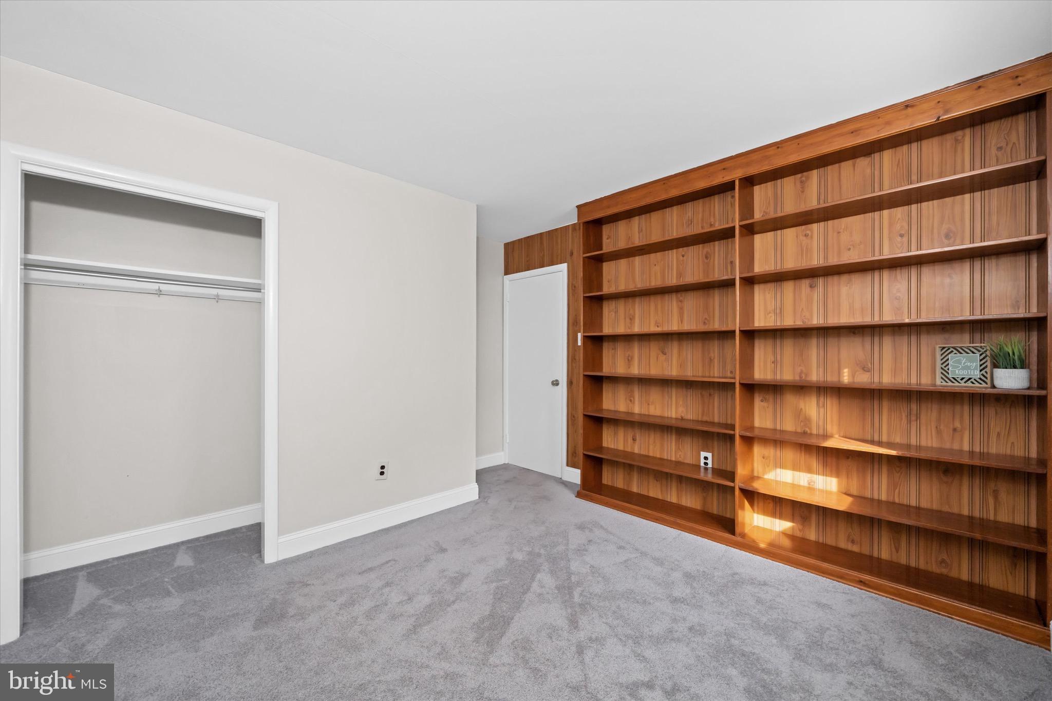 124 Festone Avenue New Castle, DE 19720 - Photo 27 of 43 a view of an empty room with empty shelves