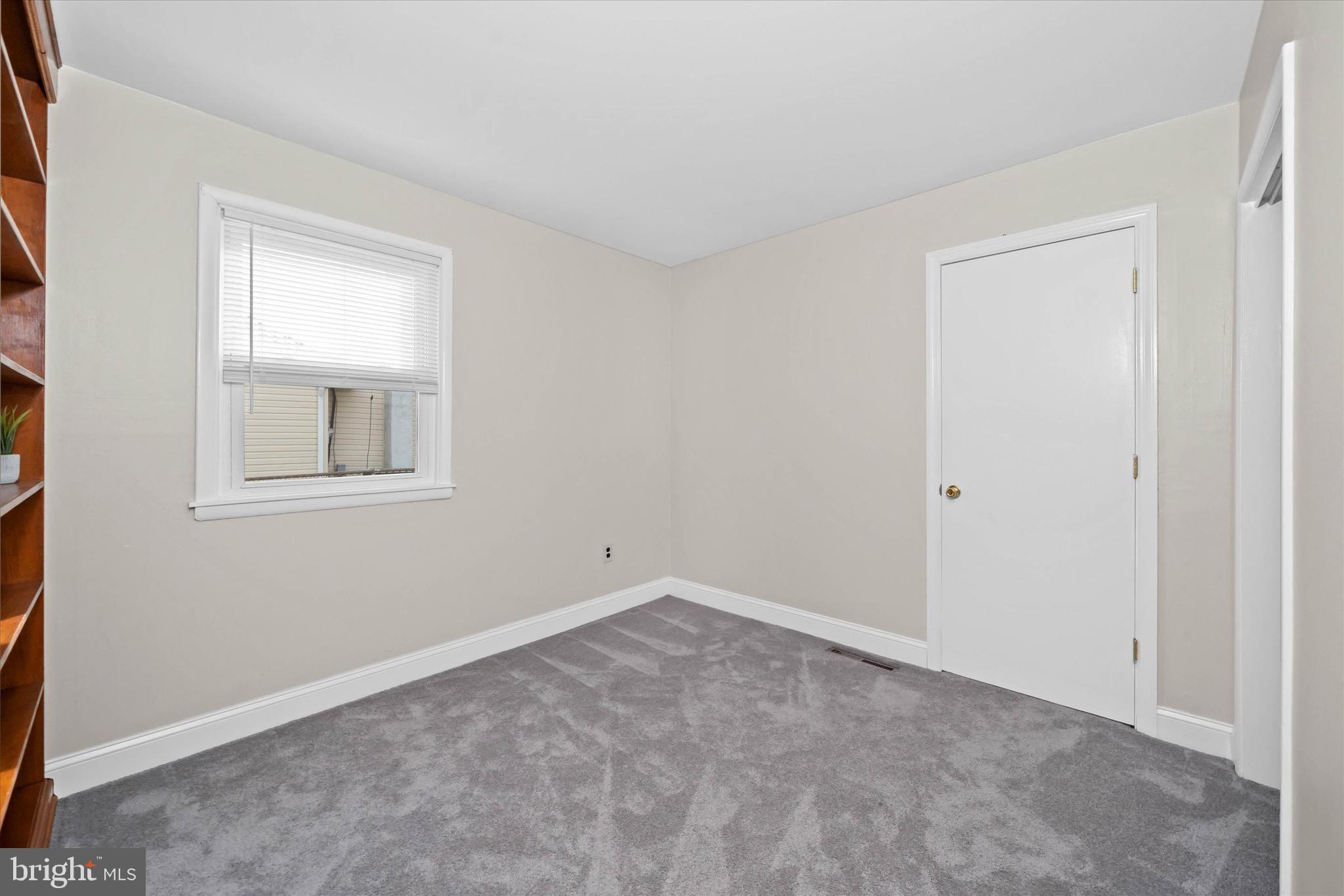 124 Festone Avenue New Castle, DE 19720 - Photo 28 of 43 a view of an empty room with a window