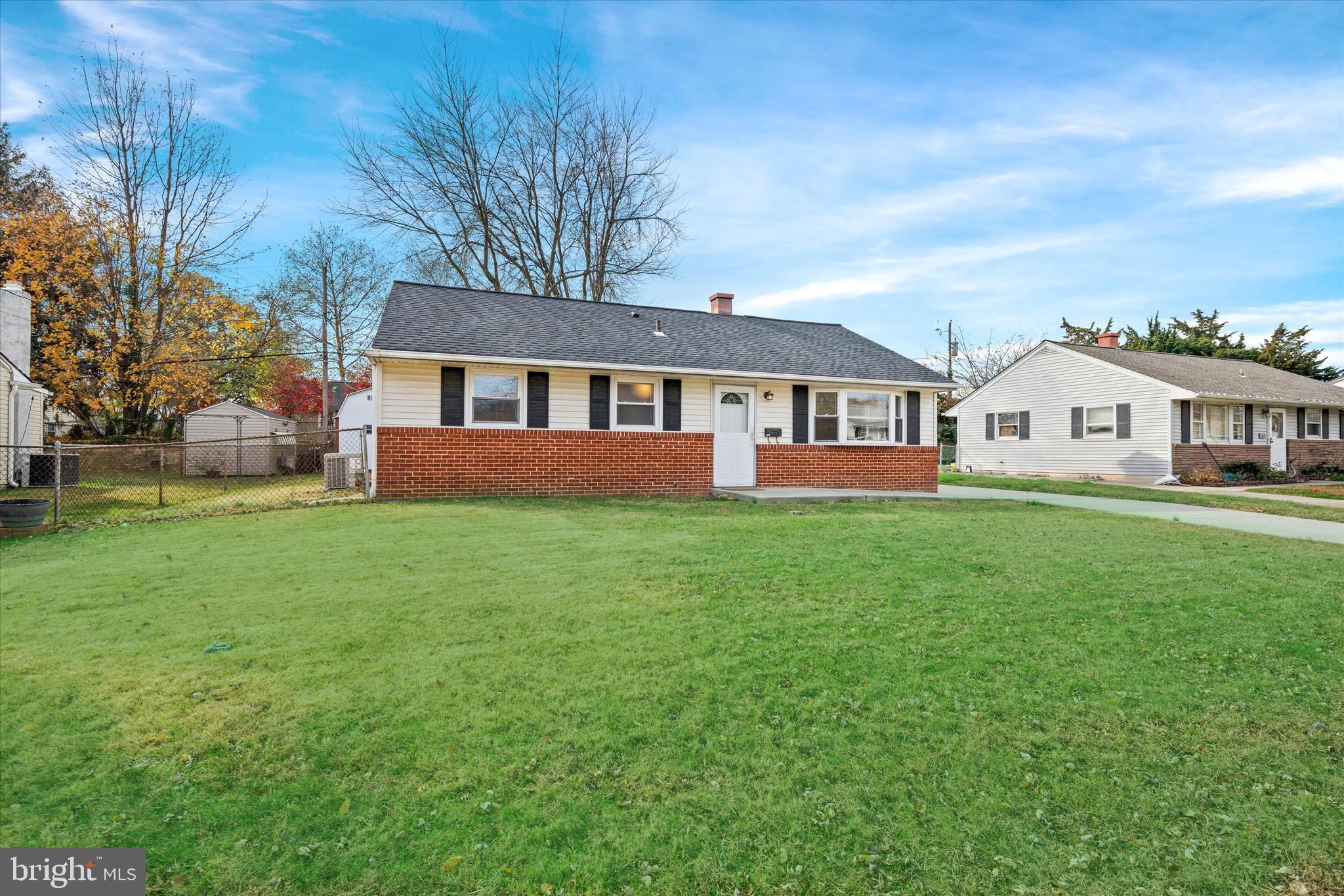 124 Festone Avenue New Castle, DE 19720 - Photo 43 of 43 a front view of a house with a yard