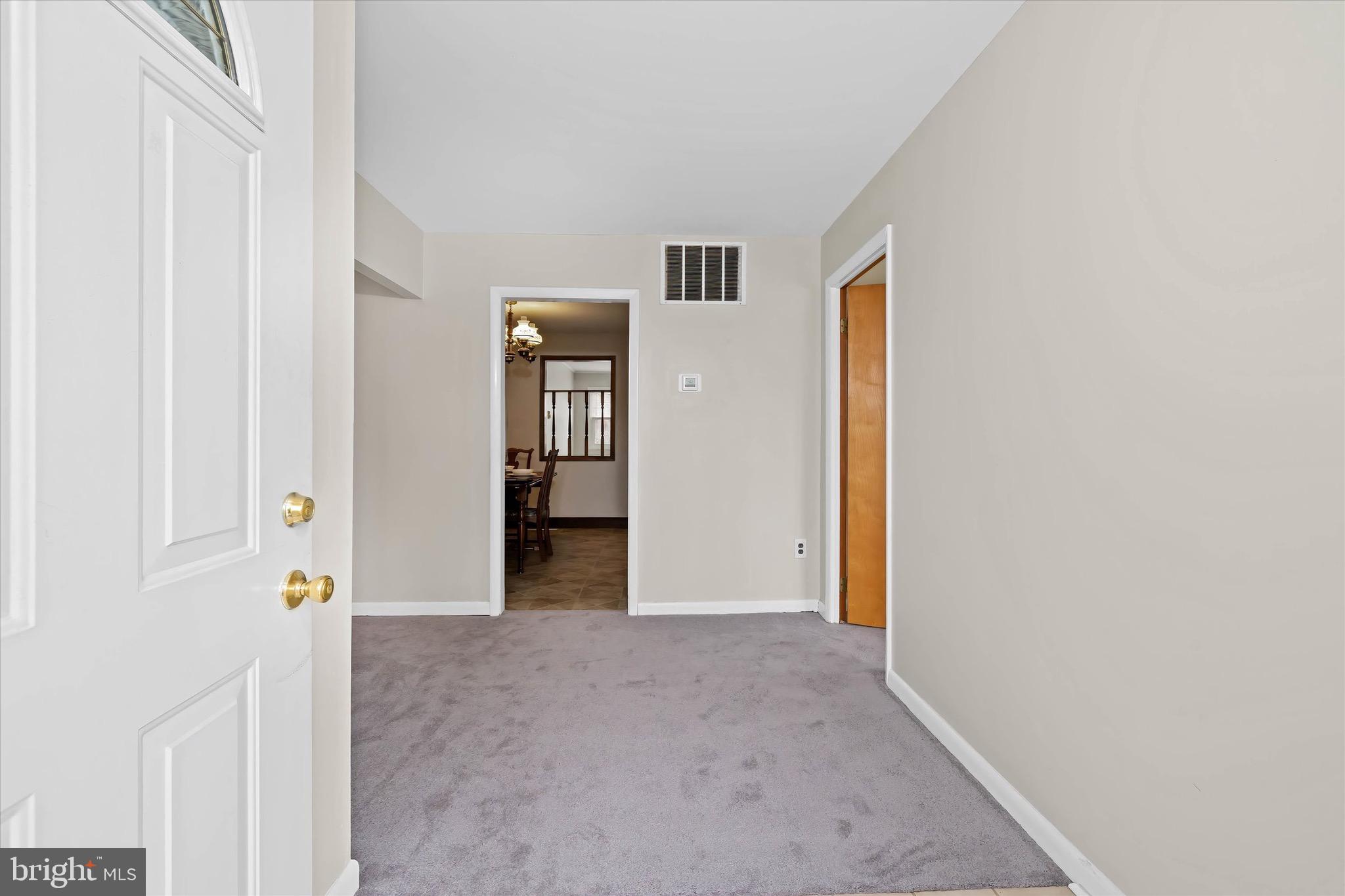 124 Festone Avenue New Castle, DE 19720 - Photo 5 of 43 an empty room with closet and mirror