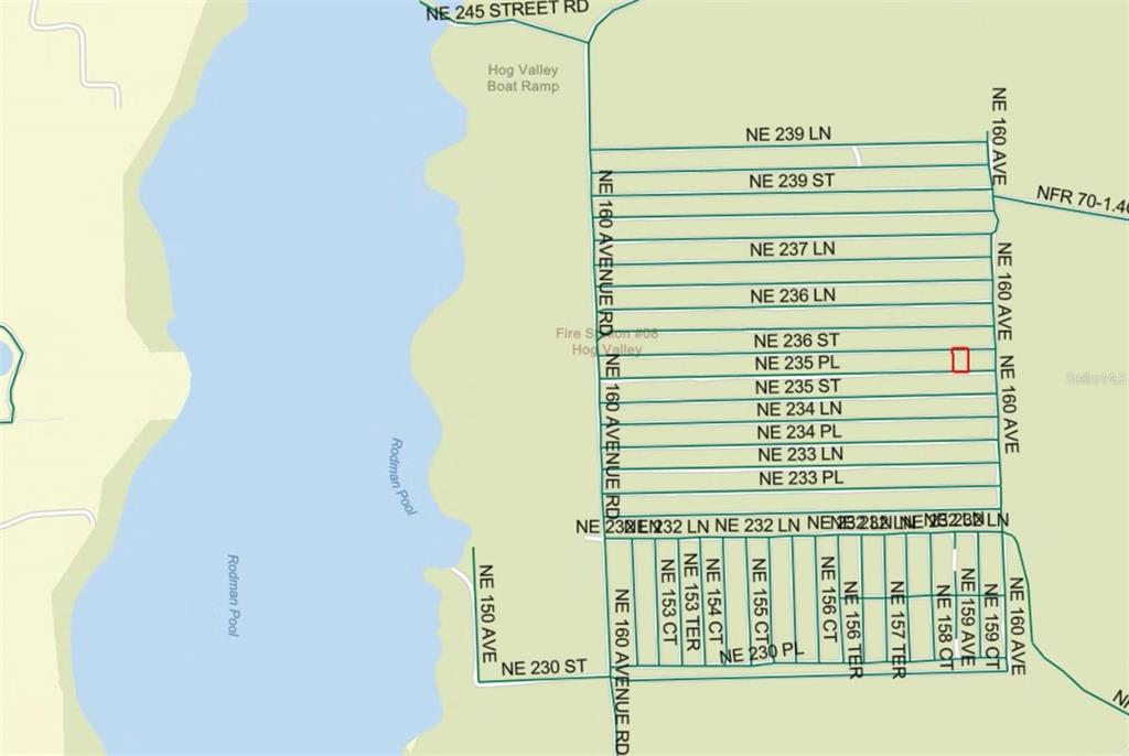 21 Ne Street Ocala, FL 34470 - Photo 3 of 3 a bathroom with a shower and a mirror