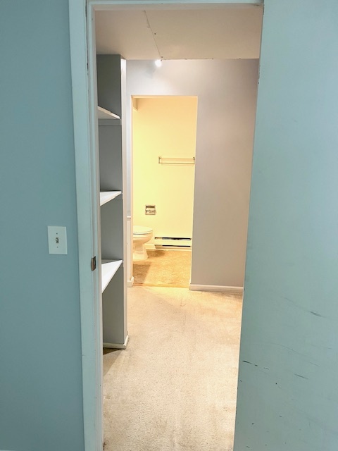 1201 Pleasant Run Drive, Unit 307 Wheeling, IL 60090 - Photo 7 of 7 a view of a bathroom from a hallway