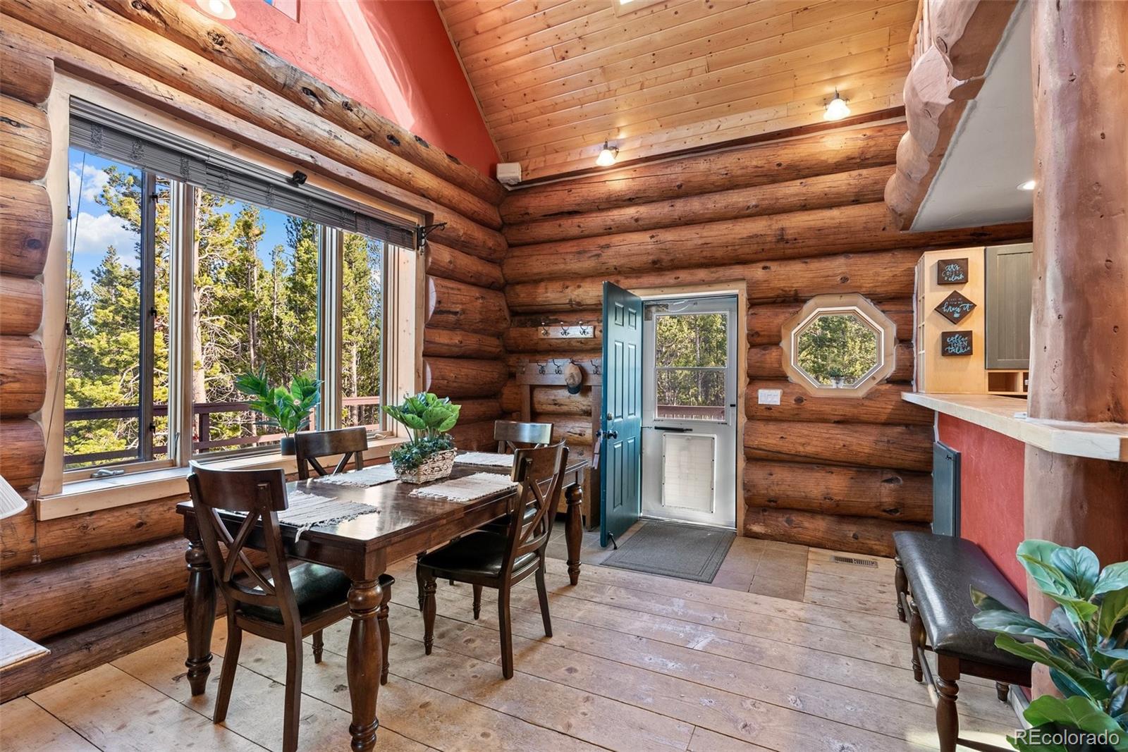 96 Eva Road Idaho Springs, CO 80452 - Photo 13 of 34 a dining room with furniture and window