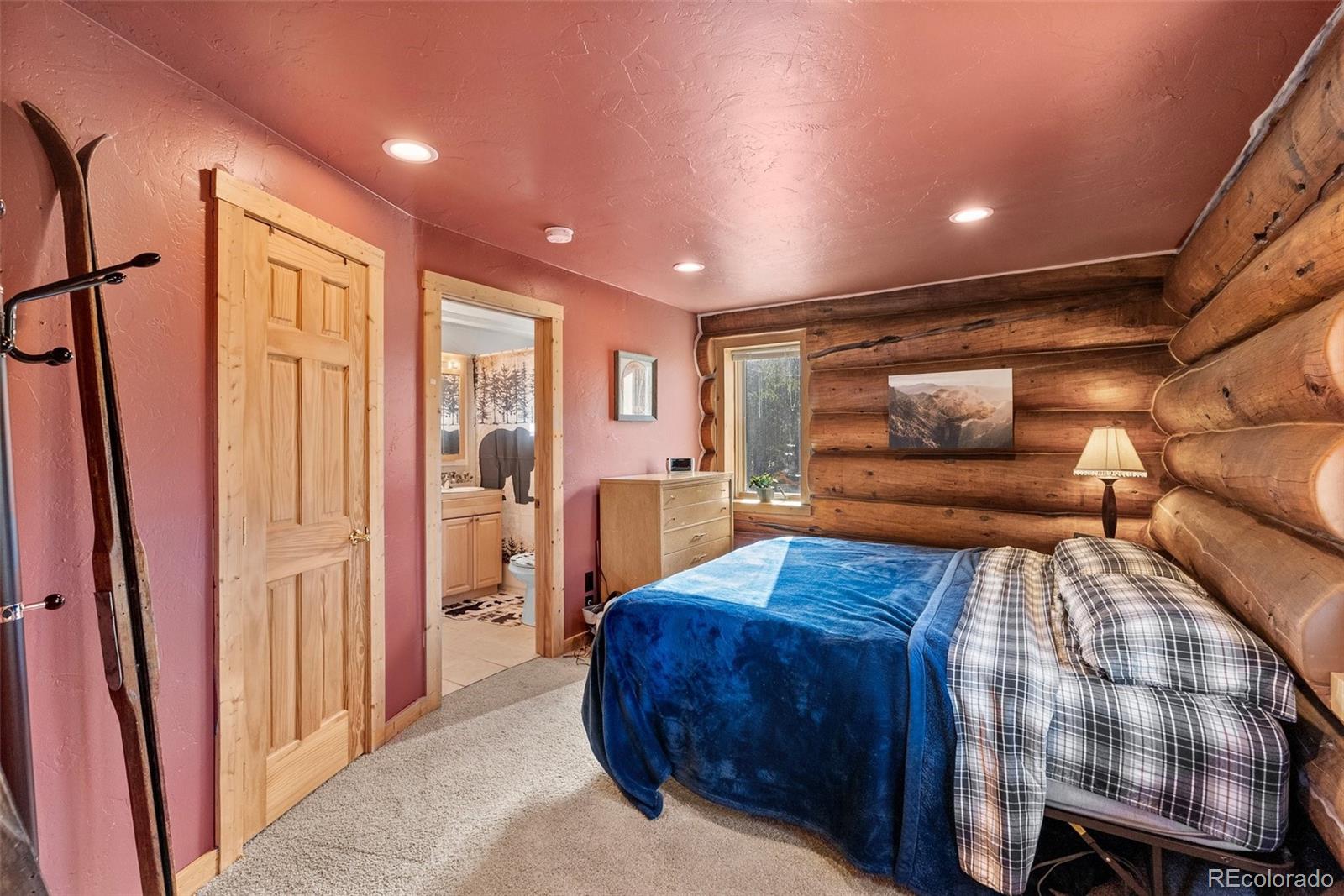 96 Eva Road Idaho Springs, CO 80452 - Photo 18 of 34 a living room with furniture and a flat screen tv
