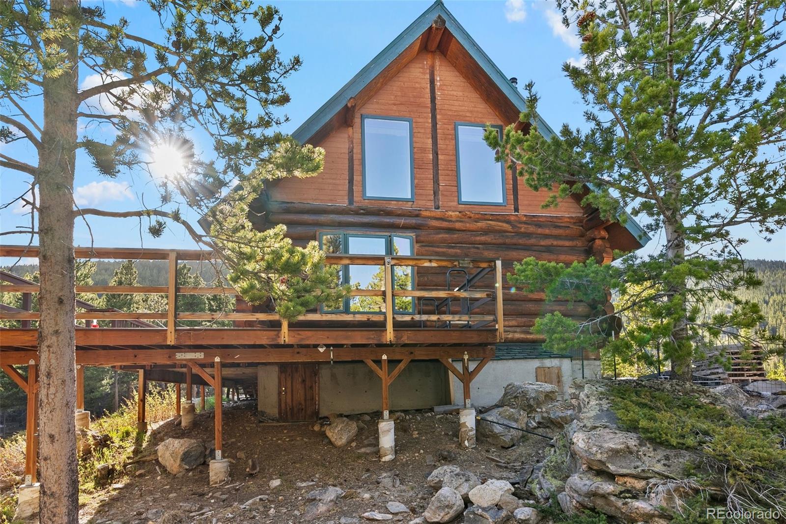 96 Eva Road Idaho Springs, CO 80452 - Photo 28 of 34 a view of house with outdoor seating area
