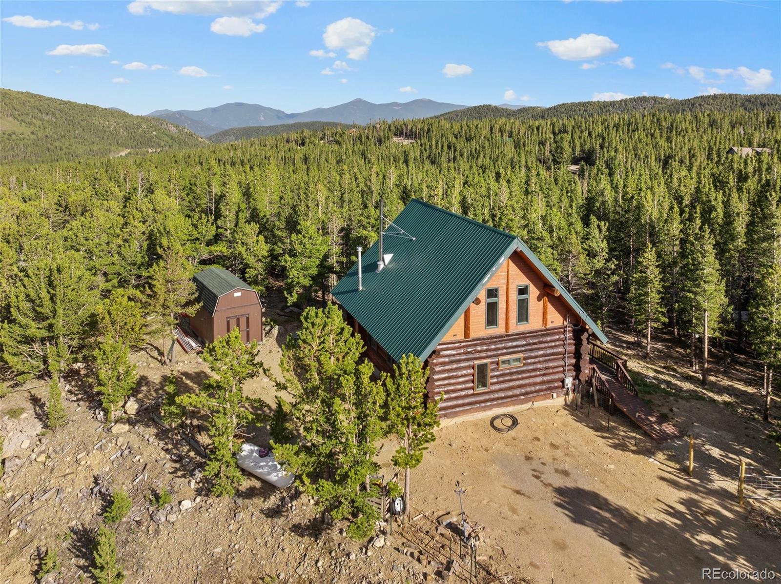 96 Eva Road Idaho Springs, CO 80452 - Photo 31 of 34 a view of a balcony with an outdoor space