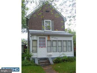 3042 Congress Road Camden, NJ 08104 - Photo 1 of 6 a front view of a house with garden