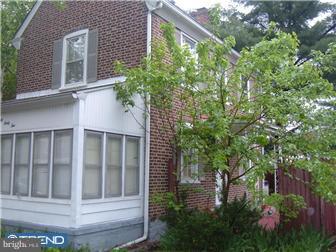 3042 Congress Road Camden, NJ 08104 - Photo 6 of 6 a view of a house with a plants and a tree